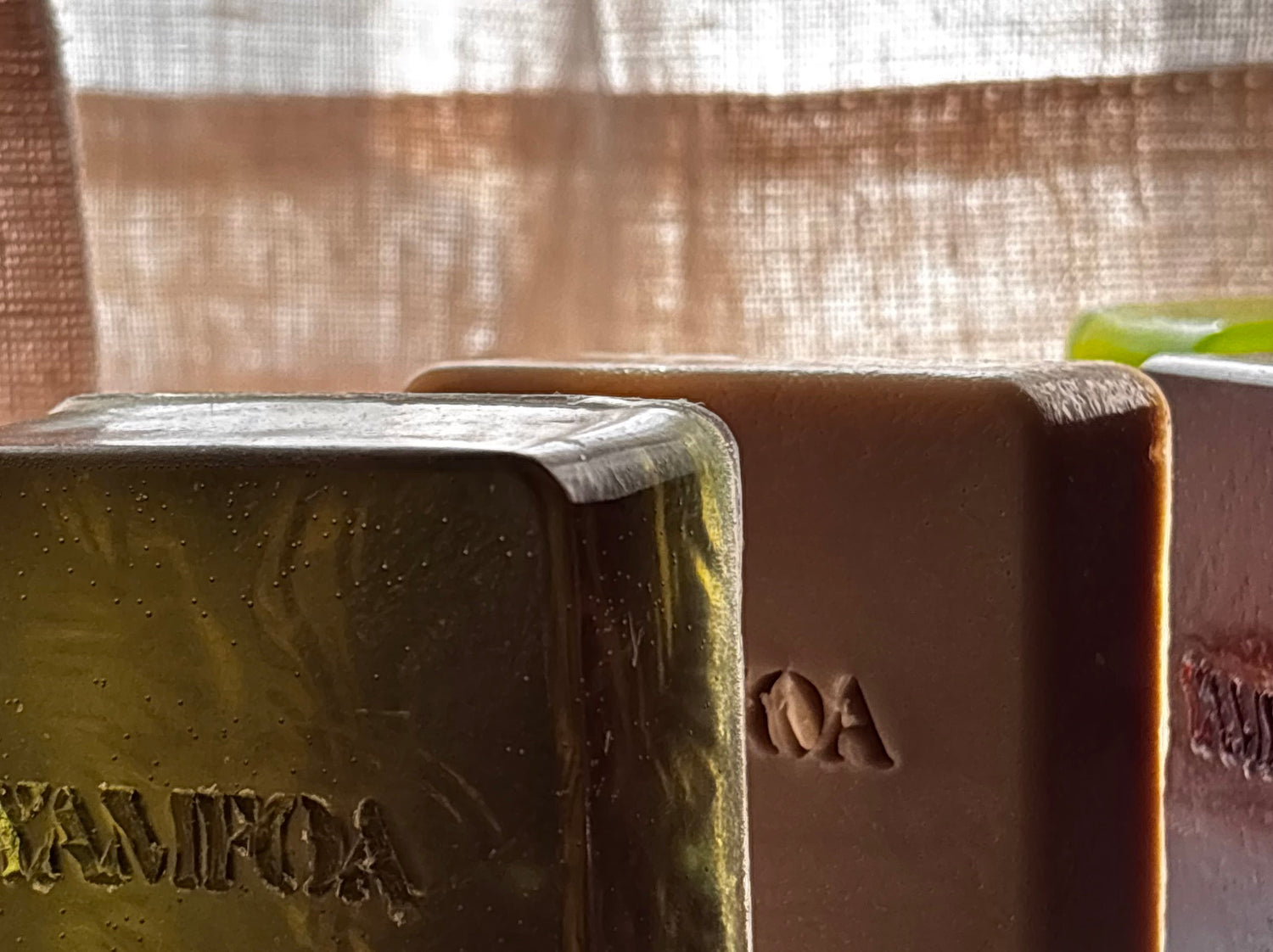 YAMFOA soaps holding light